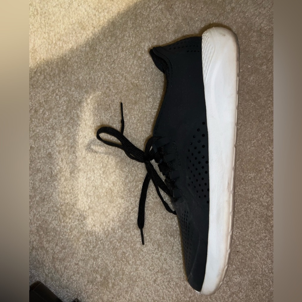 Women’s Crocs Tennis shoes size 10. Worn once. Just not the right fit for me.